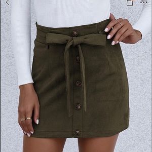Self belted suede skirt.